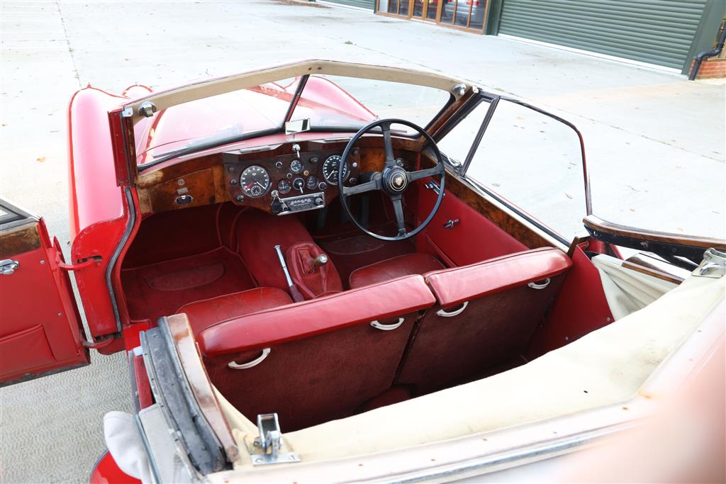 A 1955 Jaguar XK140 DHC